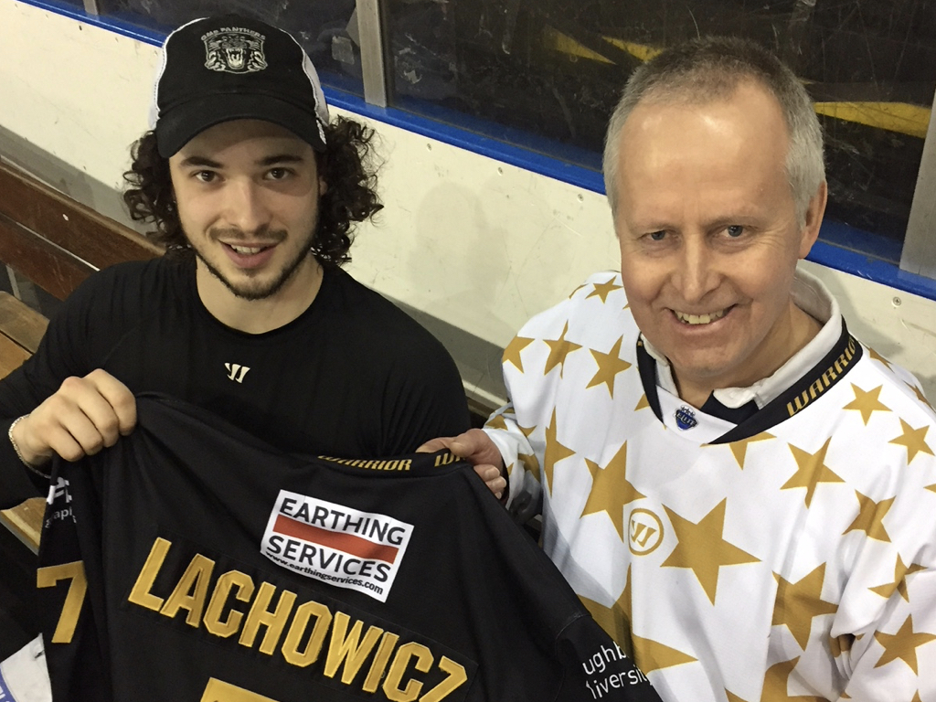 Fan Philip came in a Festive replica shirt and left in Lacho’s game worn Number Seven jersey Top Image