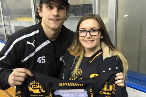 Emily bags Steve Lee's shirt in raffle