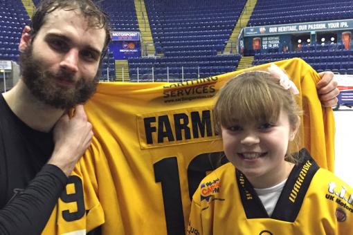 Twelve year old Mia wins Farms' shirt in Wednesday night's raffle