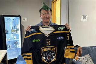 RICK ASTLEY PRESENTED WITH PANTHERS JERSEY