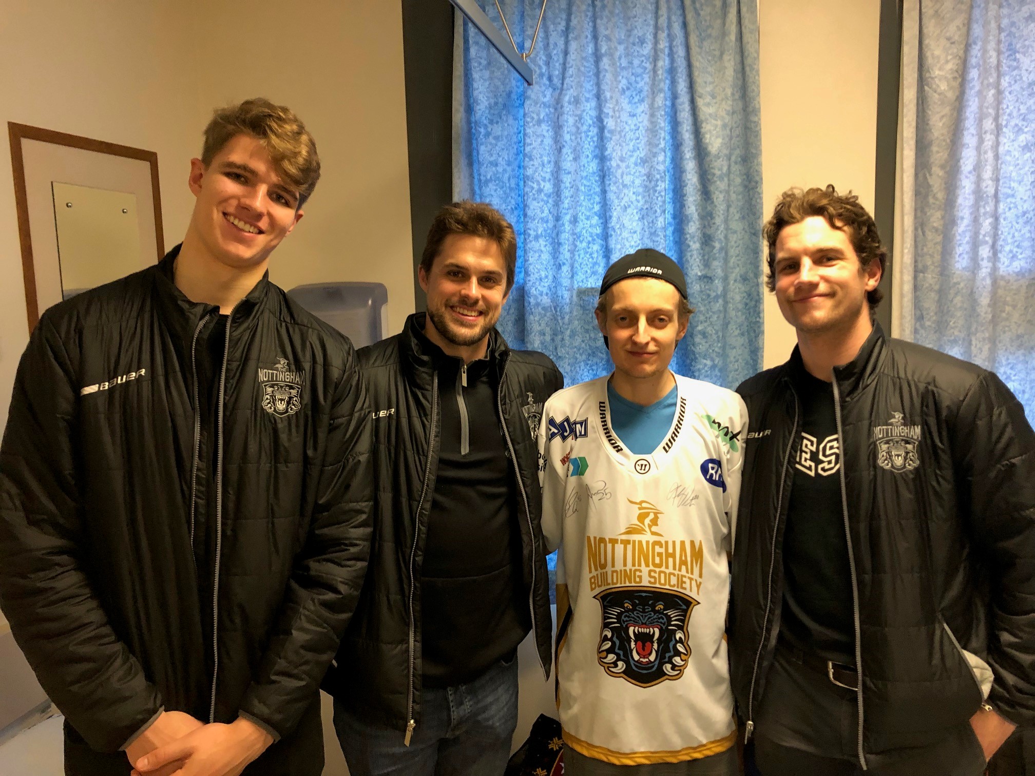Players visit Lewis in hospital Top Image
