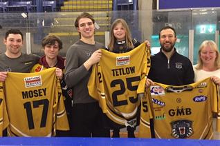 Tetlow, Vaskivuo and Mosey hand over shirts