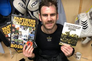 Team to sign books and calendars